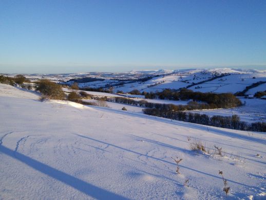 Snow! The Black Mountains in the background, and the Barn Annexe middle right