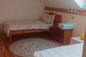 The bedroom with two single beds